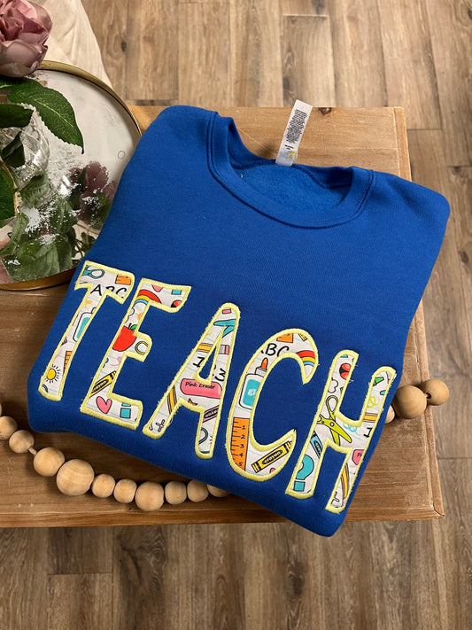 Embroidered Teach Sweatshirt in Royal Blue