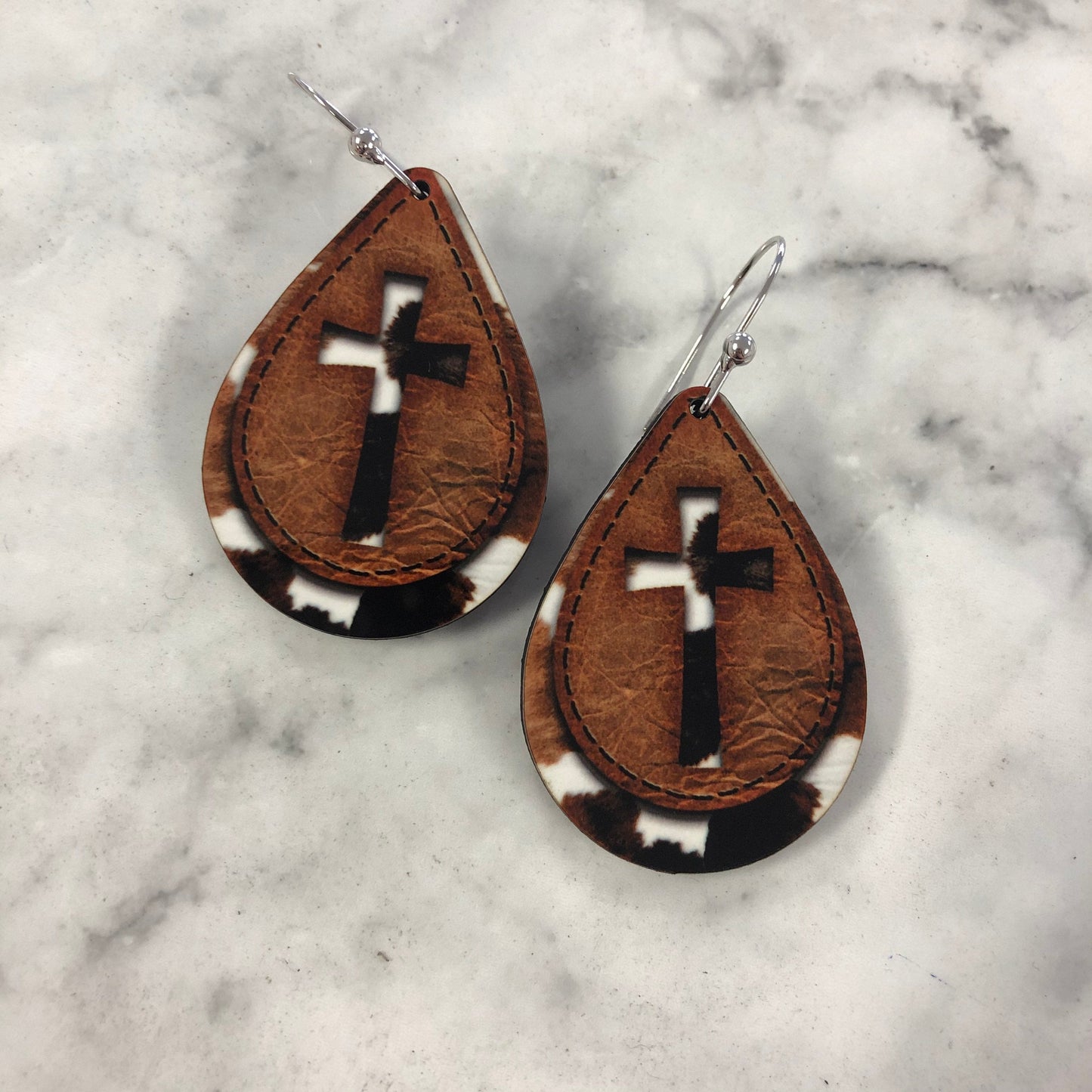 Sally Cross Earrings in Cow Print