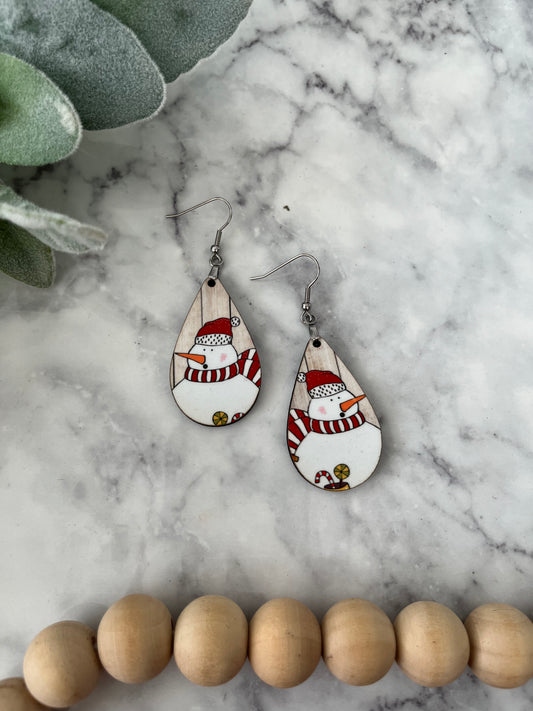 Olivia Snowman Earrings on Wood